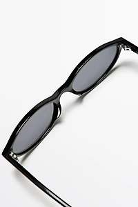 Elongated sunglasses