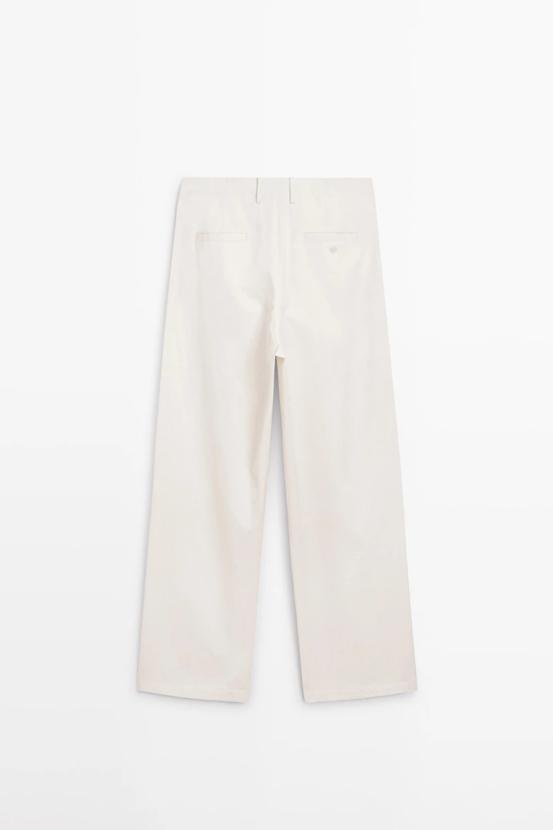 Pantalon à plis et fermeture croisée - STUDIO