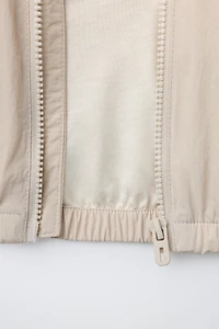 LIGHTWEIGHT COLORBLOCK WATER REPELLENT RAINCOAT