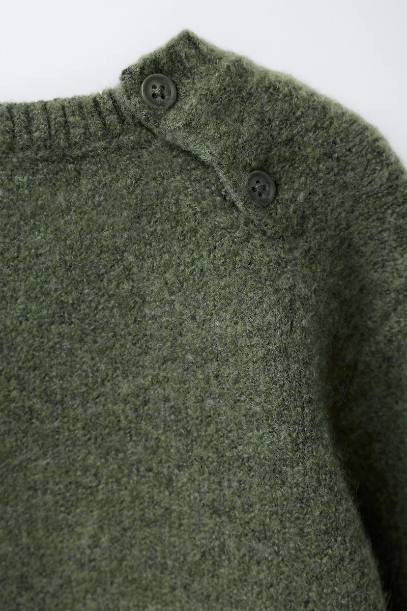 PULL EN MAILLE AVEC ARBRE BRODÉ