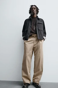 RELAXED FIT PLEATED PANTS