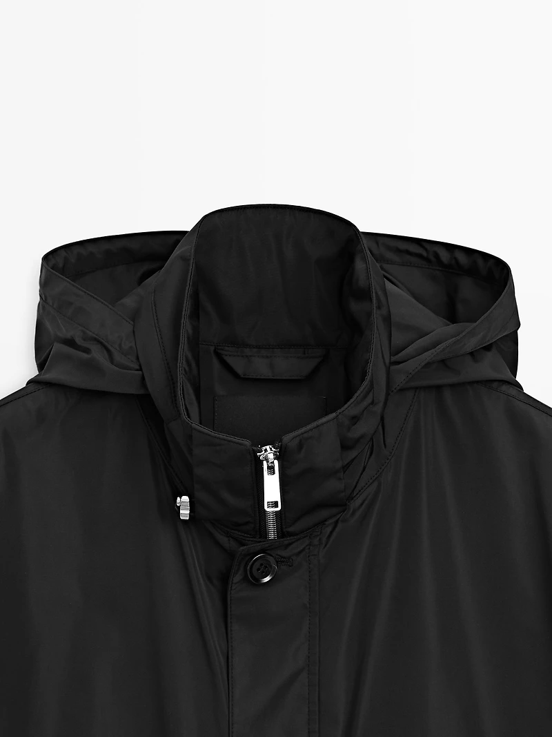 Hooded parka with fabric detail