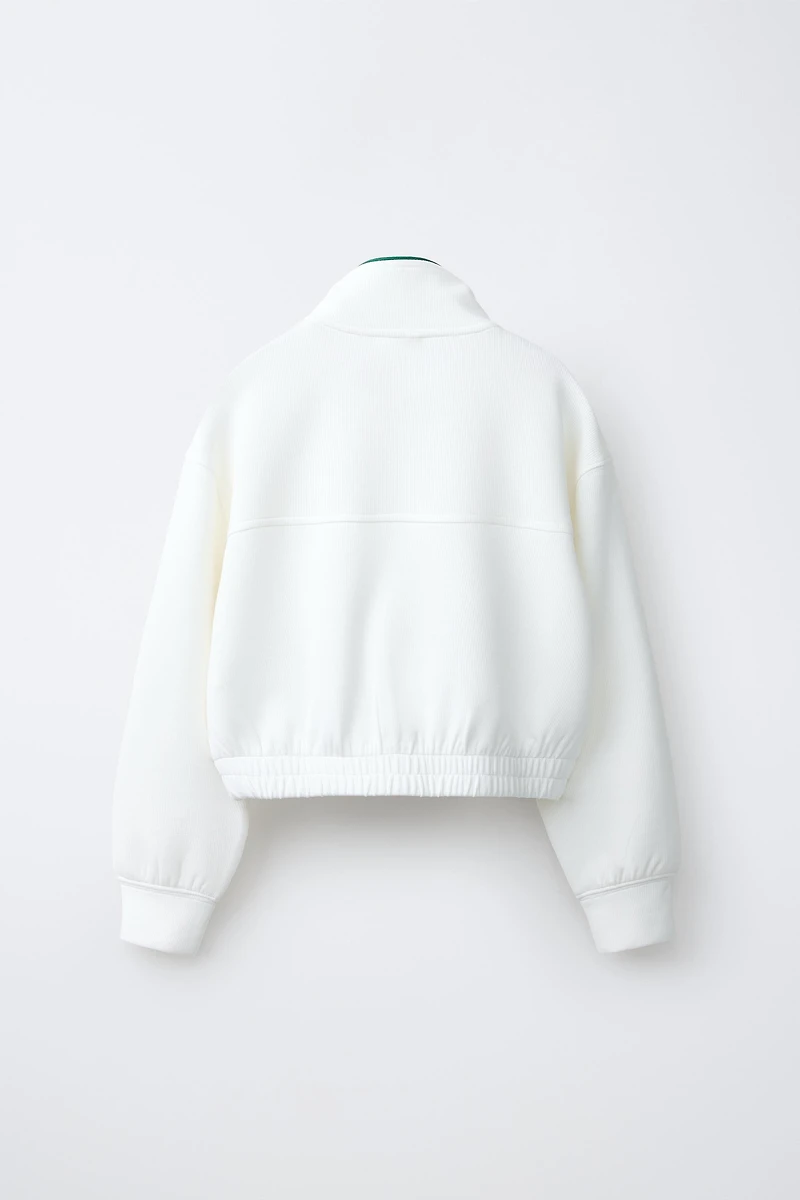 SWEAT CÔTELÉ ZIPPÉ LISERÉS CONTRASTE
