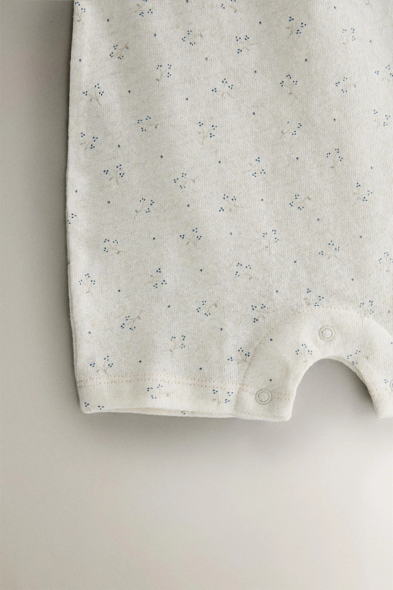 CHILDREN'S FLORAL PRINT FOOTED ROMPER