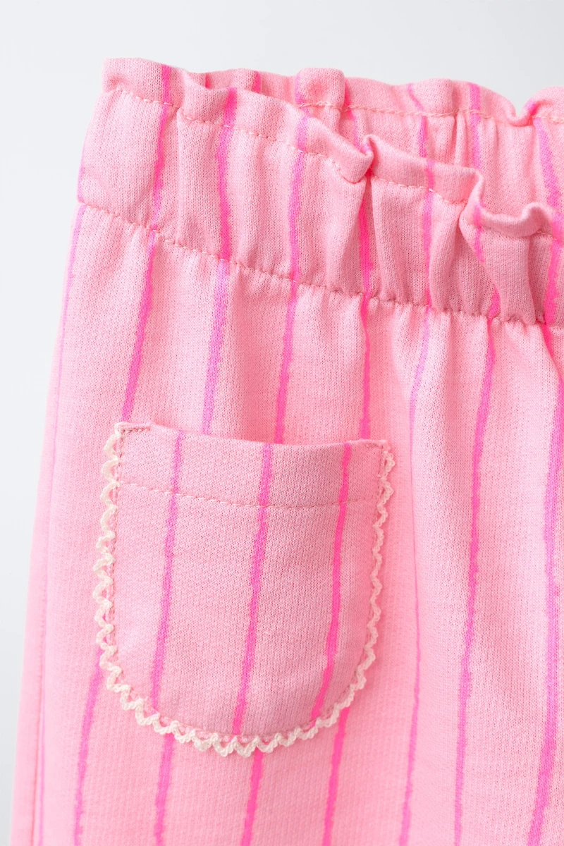 CONTRASTING STRIPE PANTS