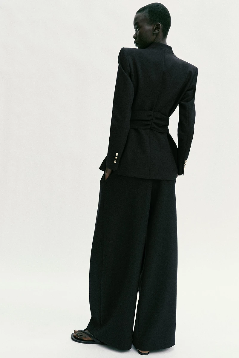 HIGH-WAISTED PLEATED PANTS