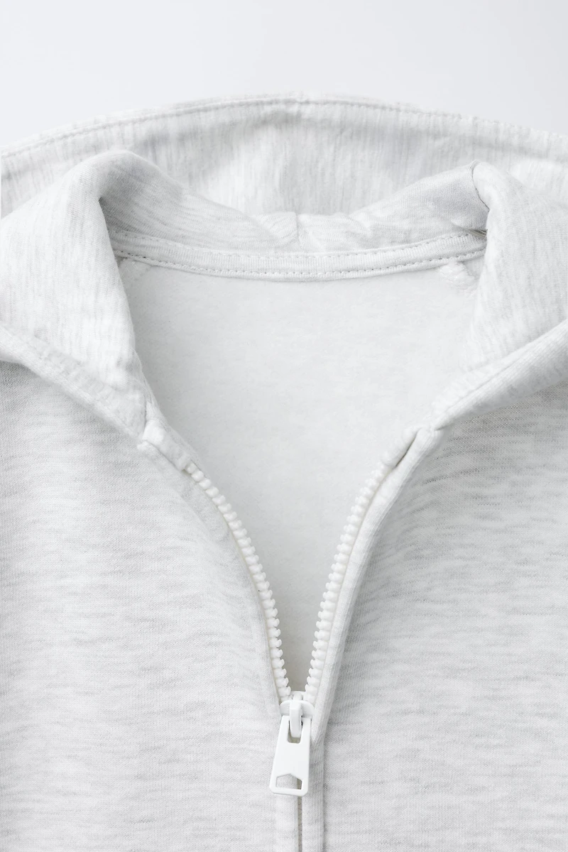 SWEAT EN MOLLETON ZIPP