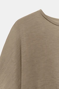 ASYMMETRIC CAPE TOP