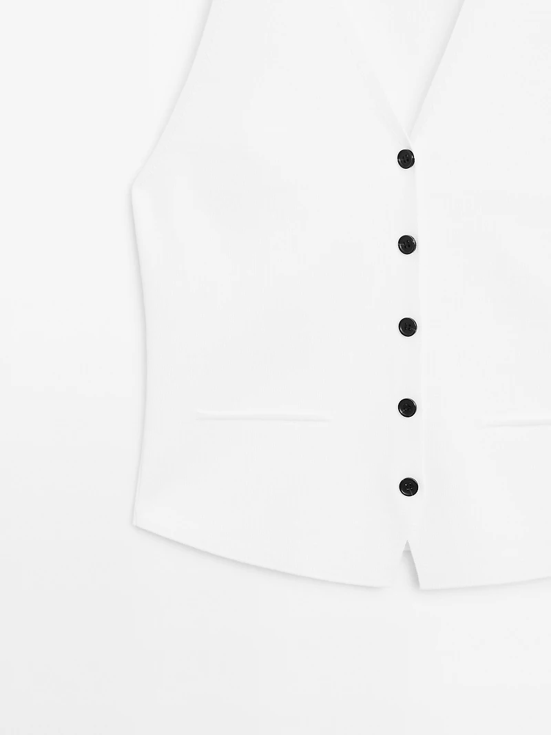 Knit waistcoat with contrast buttons