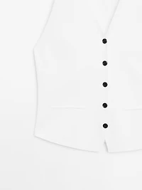 Knit waistcoat with contrast buttons
