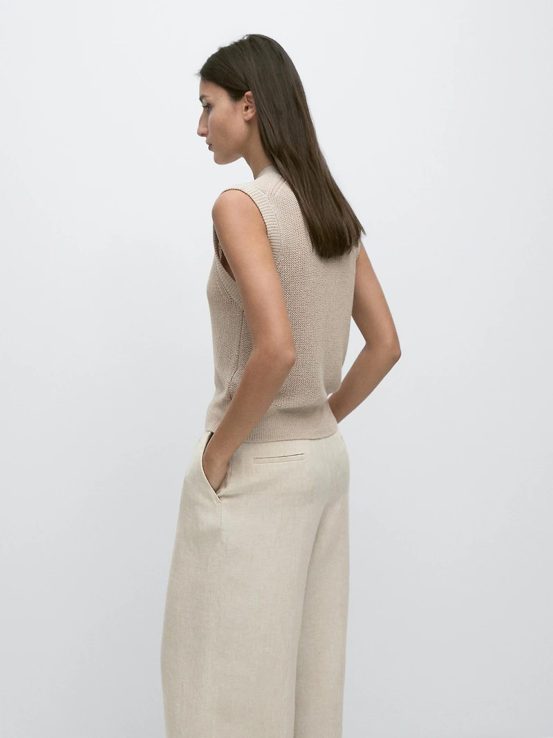 Knit vest with a high neck