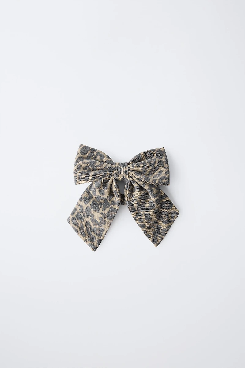 CHOUCHOU AVEC NŒUD ANIMAL PRINT