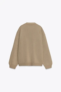 OVERSIZED KNIT SWEATER