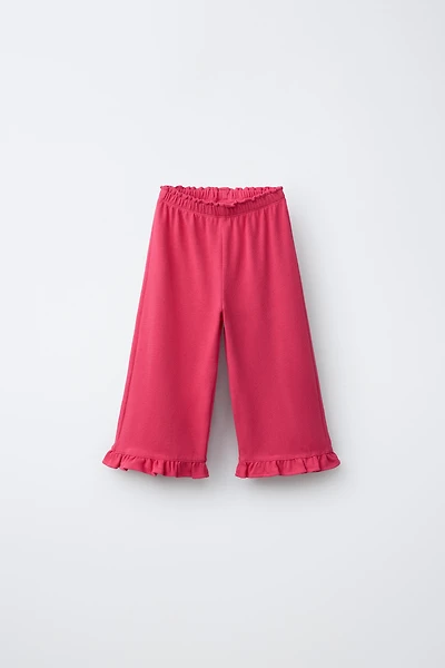 JUPE-CULOTTE À VOLANTS