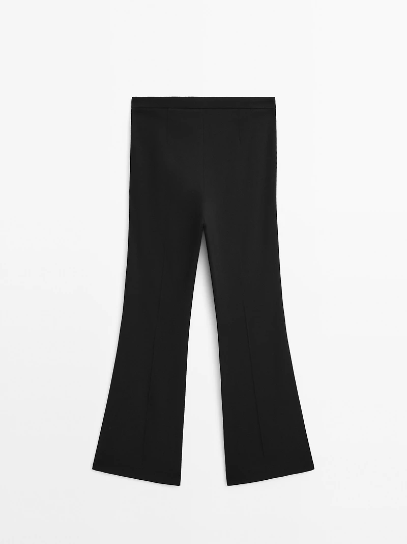 Flared trousers with pocket