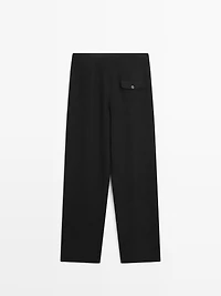 Flowing linen blend trousers with pocket details