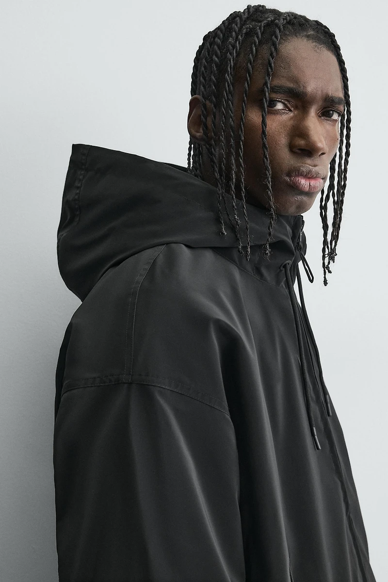 LIGHTWEIGHT HOODED TECHNICAL JACKET