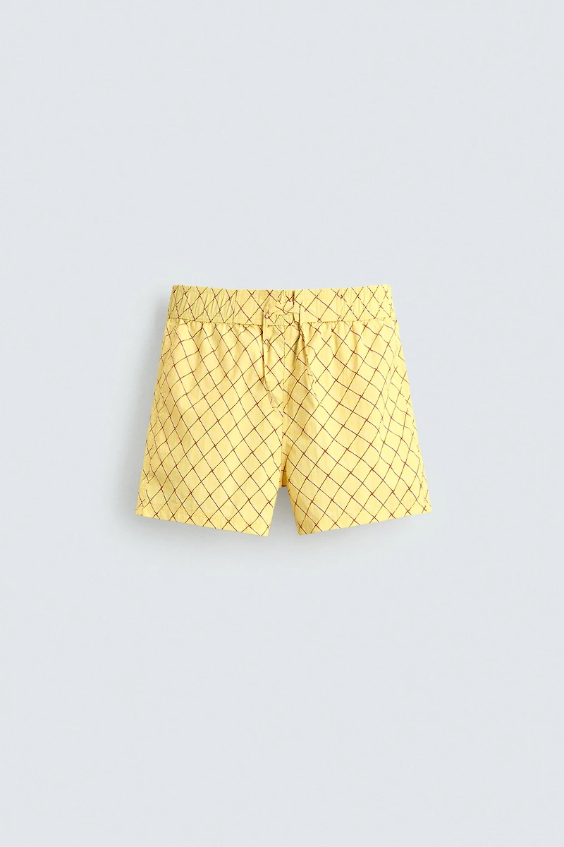 MAILLOT DE BAIN MI-LONG À IMPRIMÉ GÉOMÉTRIQUE DÉLAVÉ