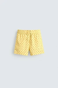 MAILLOT DE BAIN MI-LONG À IMPRIMÉ GÉOMÉTRIQUE DÉLAVÉ