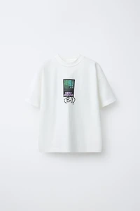 T-SHIRT IMPRIMÉ GRAFFITI