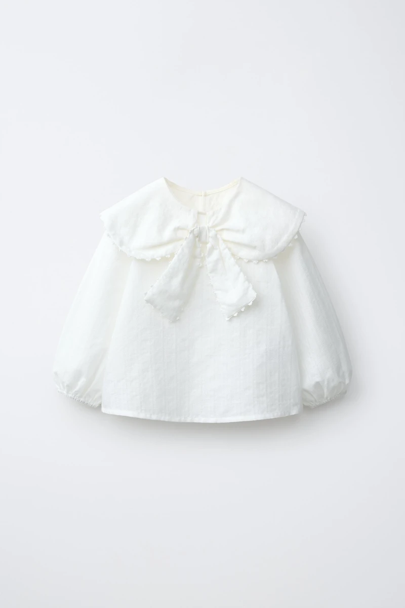 CHEMISE EN PLUMETIS À COL CLAUDINE