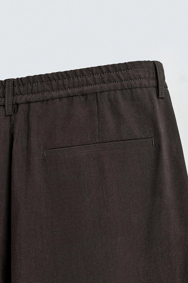 PLEATED FLOWY PANTS