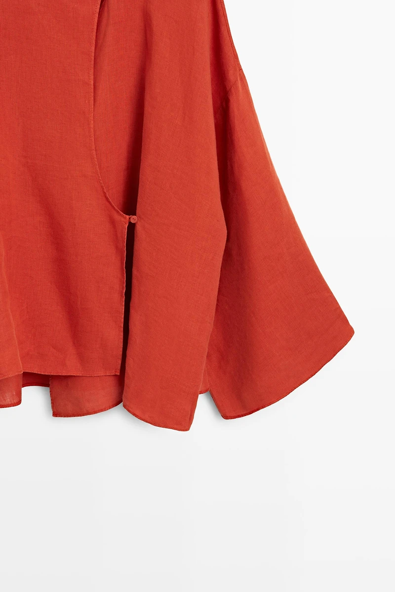 Flowing 100% linen surplice blouse