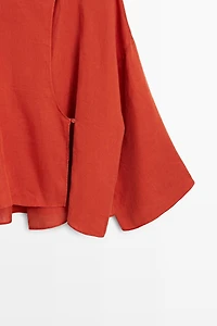 Flowing 100% linen surplice blouse