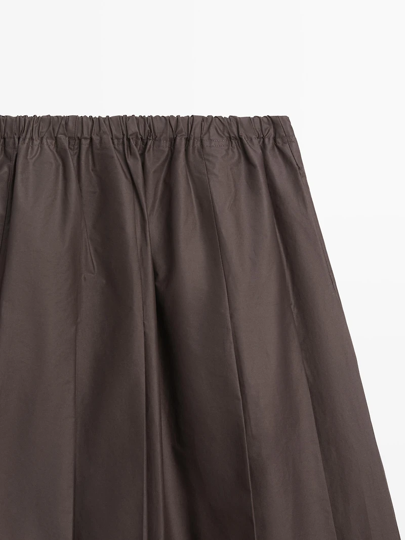 Box pleat technical fabric midi skirt