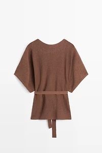 Pull en maille de coton avec ceinture