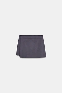 JUPE-PANTALON À CARREAUX ET PLIS PLATS