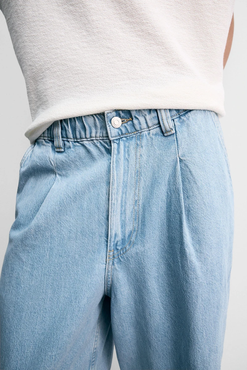 PANTALON DENIM CHINO COUPE AMPLE À PLIS
