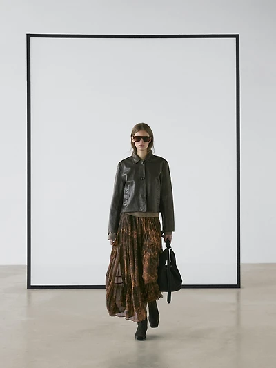 Flowing asymmetric midi skirt