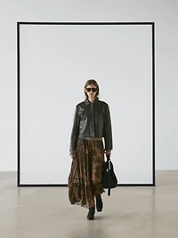 Flowing asymmetric midi skirt