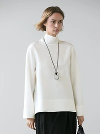 High neck blouse with hem detail