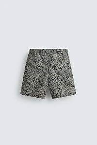 ANIMAL PRINT LONG SWIM TRUNKS