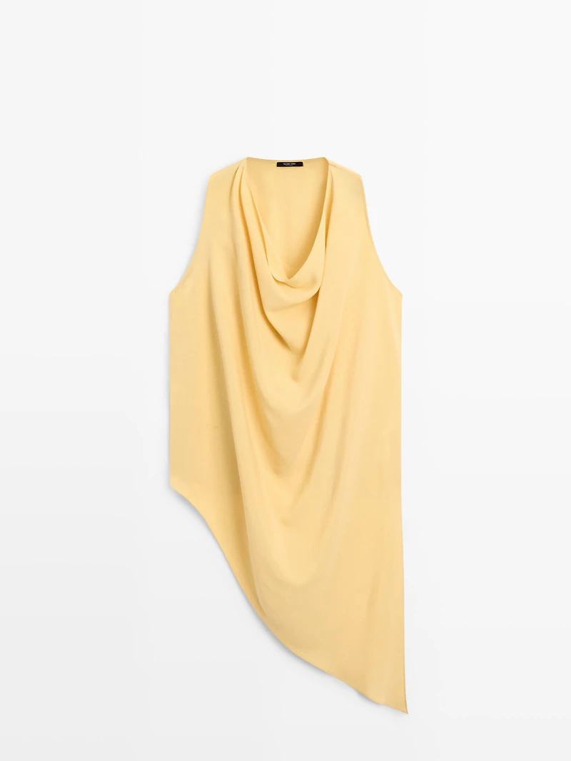 Top long fluide asymétrique
