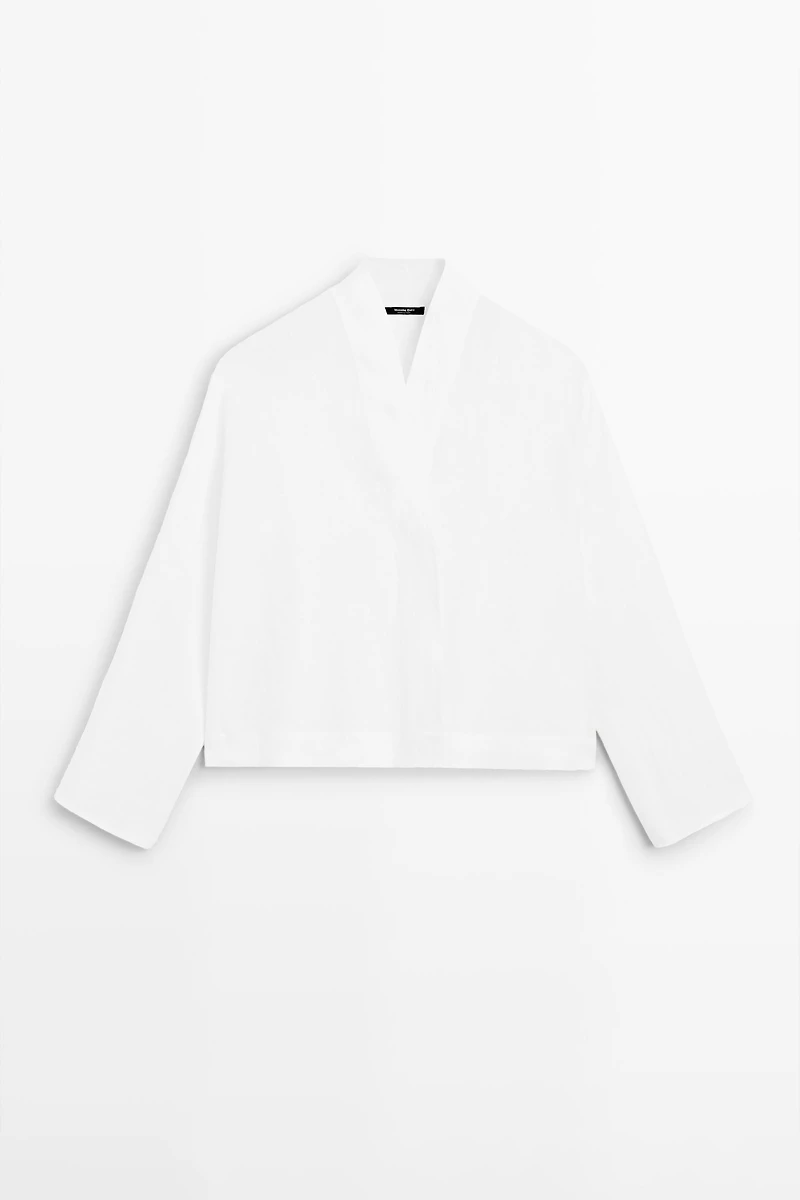 Flowing linen blouse with surplice neckline