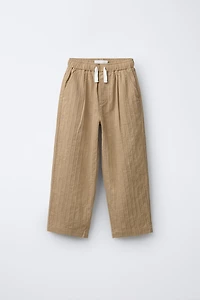STRAIGHT TEXTURED PLEATED PANTS