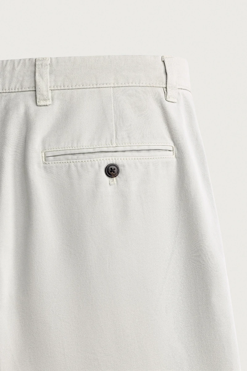 PLEATED STRAIGHT-FIT CHINO TROUSERS