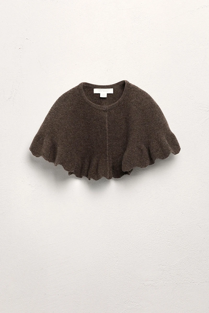 100% WOOL RUFFLED KNIT CAPE LIMITED EDITION
