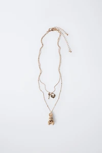 PACK OF TWO FLOCKED RABBIT AND PADLOCK NECKLACES