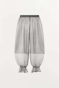 PANTALON EN MAILLE BOUFFANT À VOLANTS