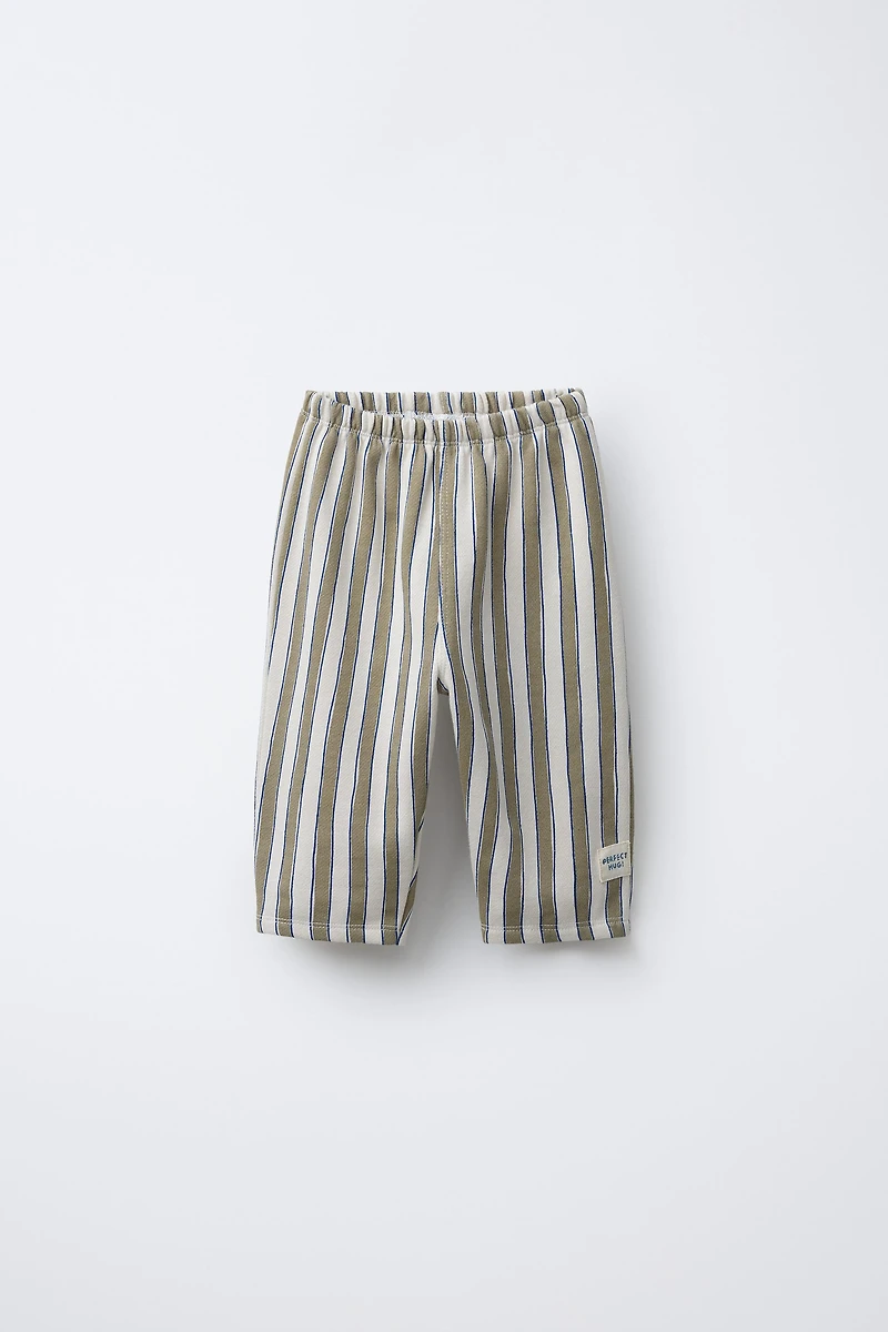PANTALON BAGGY À RAYURES ET DÉCOR ÉTIQUETTE