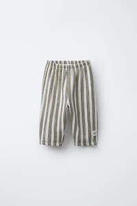 PANTALON BAGGY À RAYURES ET DÉCOR ÉTIQUETTE