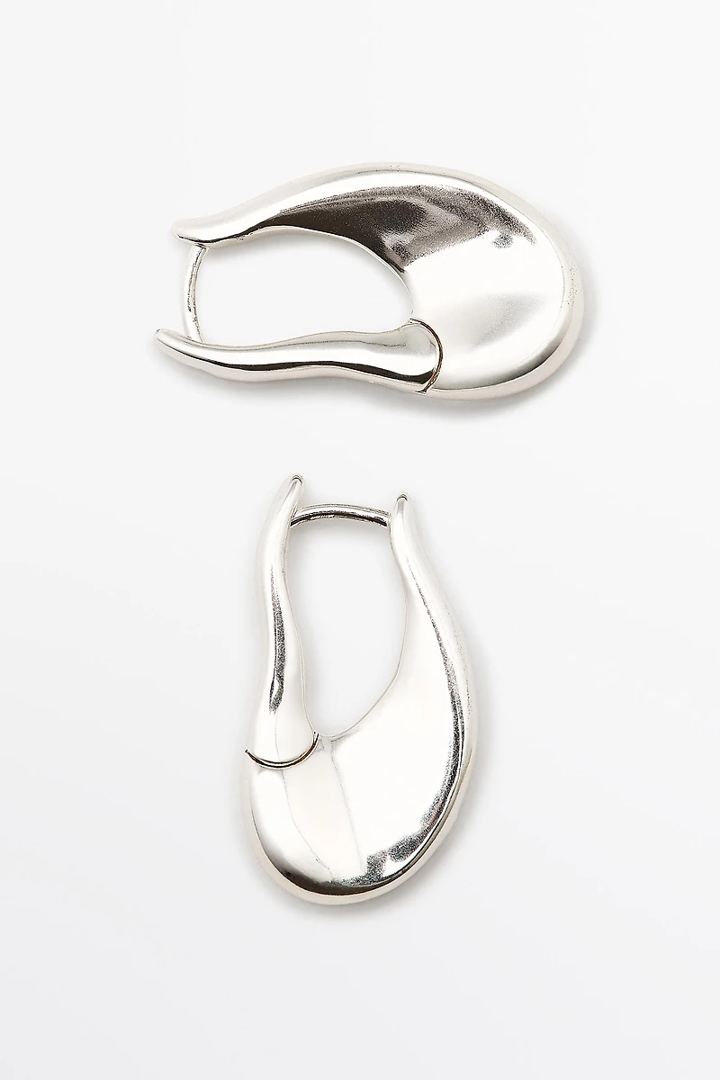 Boucles d’oreilles créoles lignes fluides