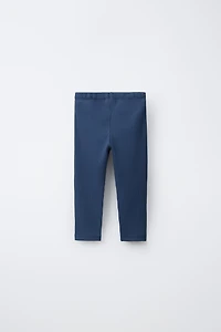 LEGGING LISSE À ÉTIQUETTE