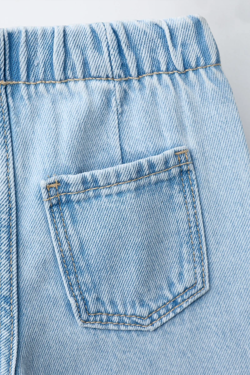 WIDE LEG RIPPED JEANS