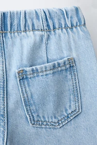 WIDE LEG RIPPED JEANS