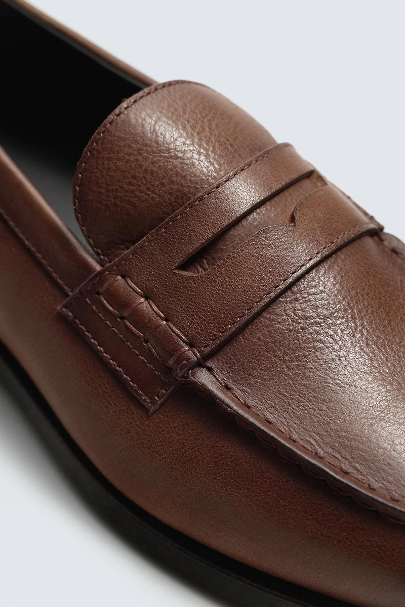 MOCASSINS EN CUIR À MASQUE